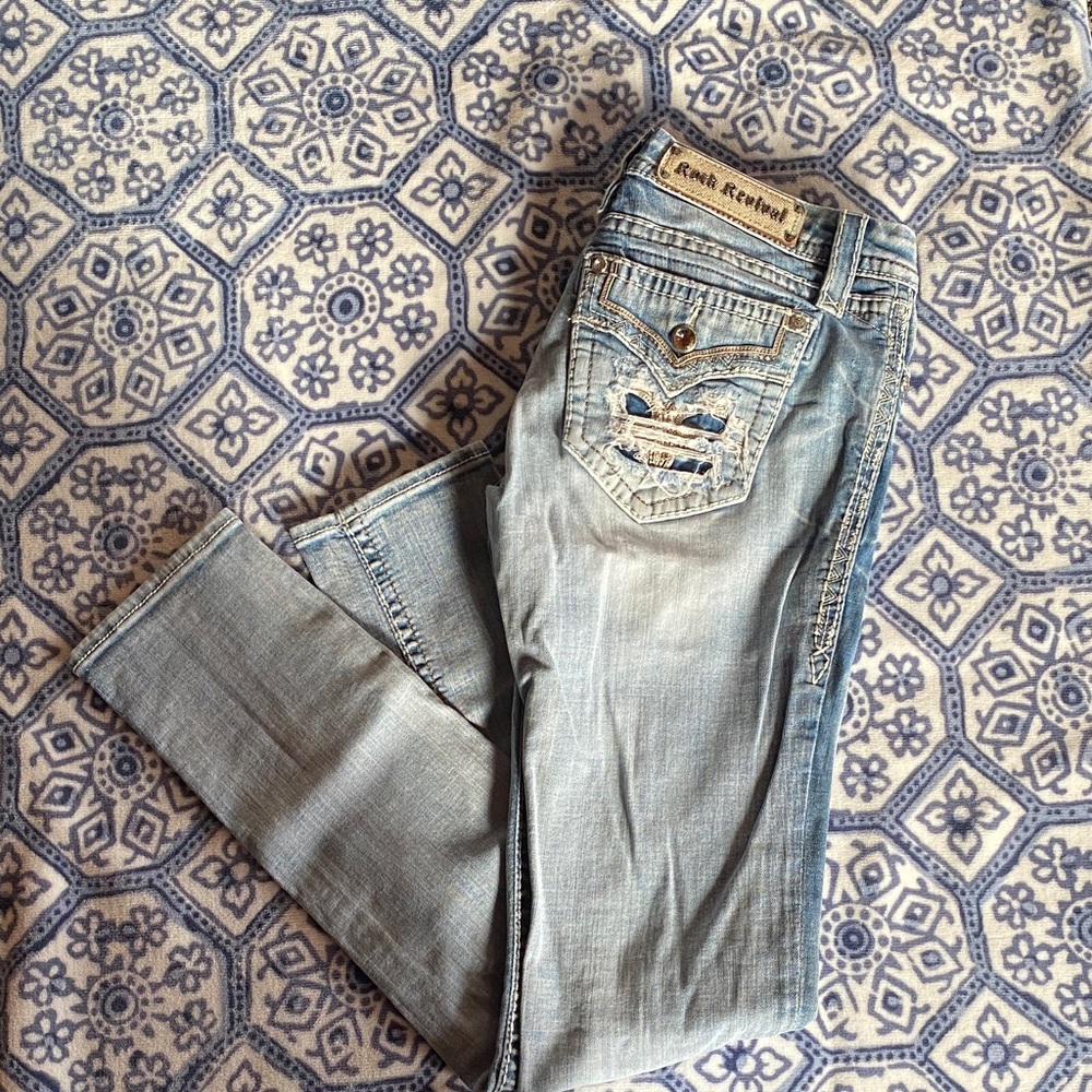 Rock Revival Light Blue Boot Cut Jeans with Distressed Pocket